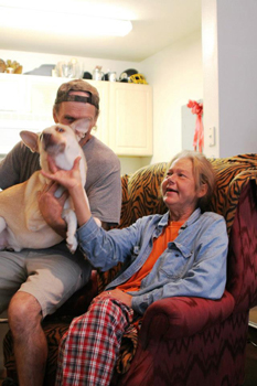 Deborah Hill and Robert Wright with Pork Chop - Success Story